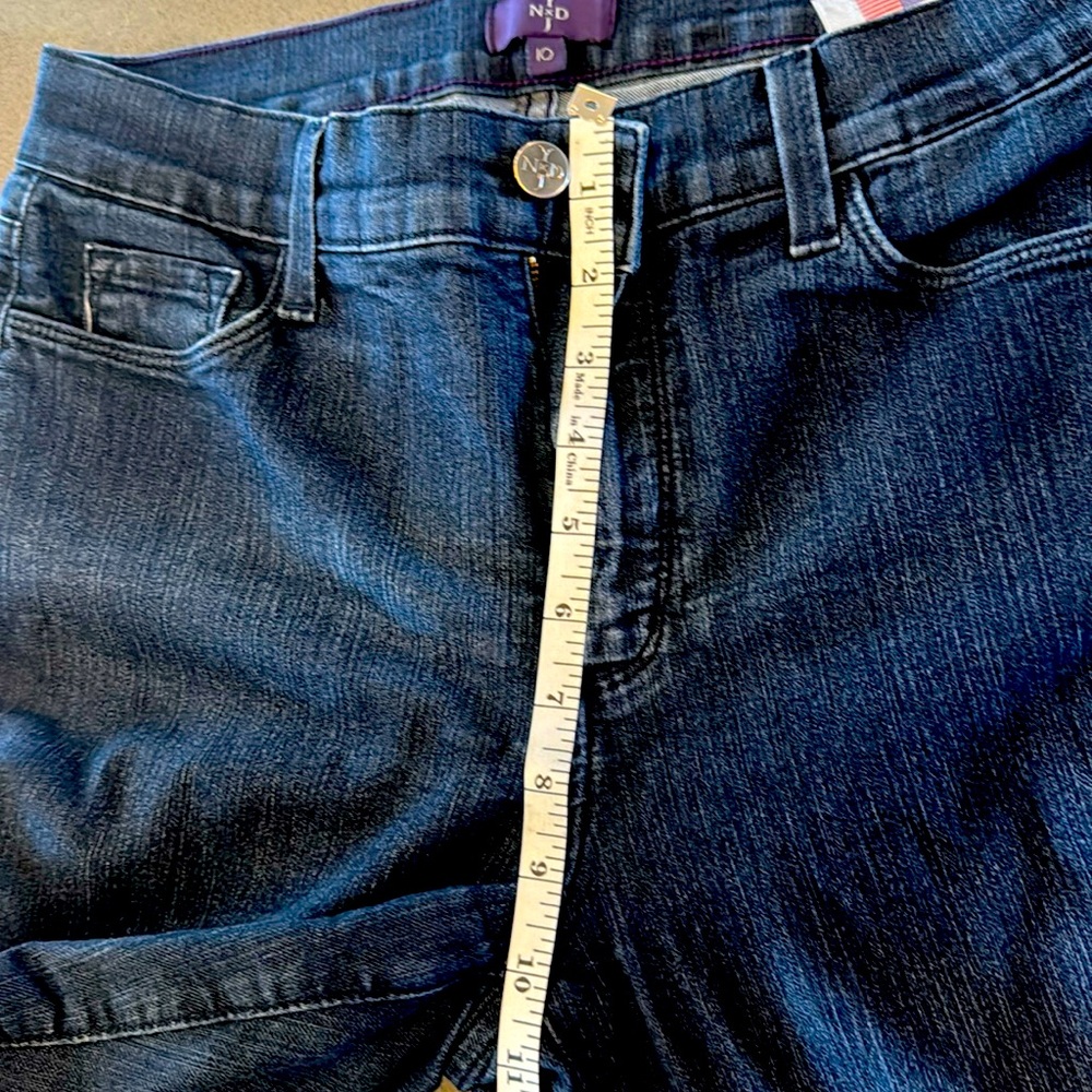 Not your daughter’s jeans. Excellent condition. Dark wash, boot cut